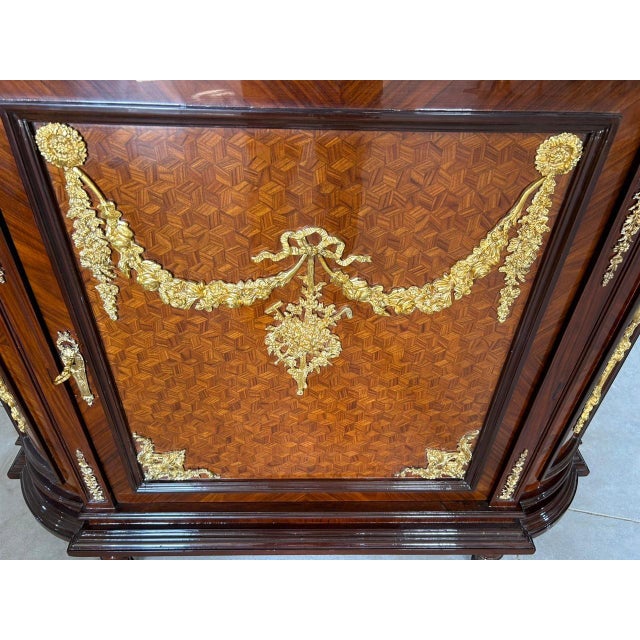 DIMENSIONS Length: 46 inches Height: 43 inches Depth: 17 inches MATERIALS Solid wood structure Fine wood veneer marquetry...