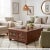 Dimensions: 41" W x 41" D x 18" H This Trunk Storage Coffee Table piece utilizes old architectural elements, re-claimed...