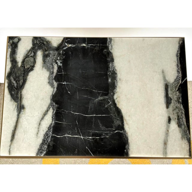 Original retail $1209, stylish Revelation Modern Black and White Marble Cantilever Accent Table, brass base, showroom...