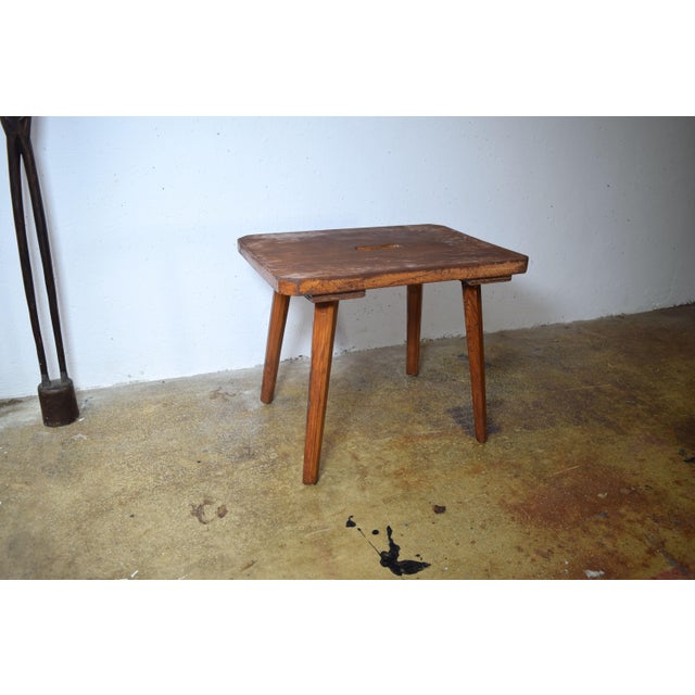 This is an antique wooden stool from a farm. The stool is made of local beech wood. The stool is stable and can still be...