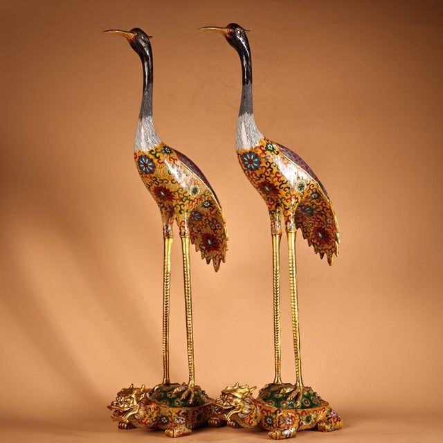 This exquisite pair of figures depicts cranes standing atop mythical turtle-dragon bases (Xuanwu), traditional symbols of...