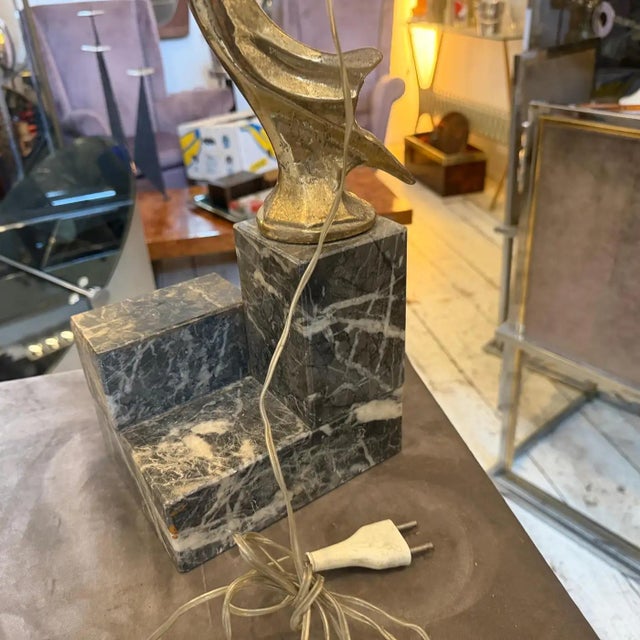 This exquisite 1930s Italian table lamp is a quintessential example of Art Deco elegance, blending architectural geometry...