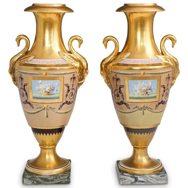 Antique early 19th century Paris porcelain urns with swan handles signed Halley. Each decorated with central reserves of...