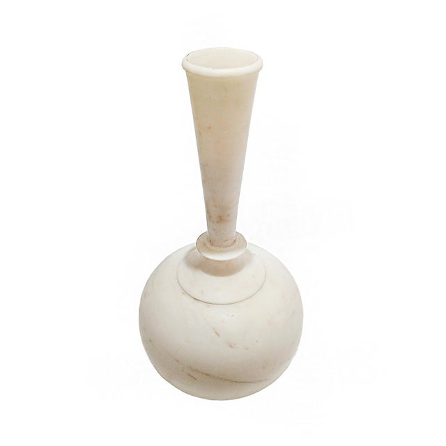 A white marble vase, hand-carved in India, circa 1960. 23 inches tall, approximately 12 inches diameter. Fluted neck....