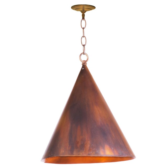 Our Copper Cone Pendant works beautifully on it's own, or grouped with multiple pieces. The copper is drenched in an acid...