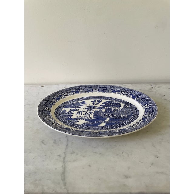 Lovely addition to any Blue willow china collection. This wonderful early 20th century platter is in wonderful condition.