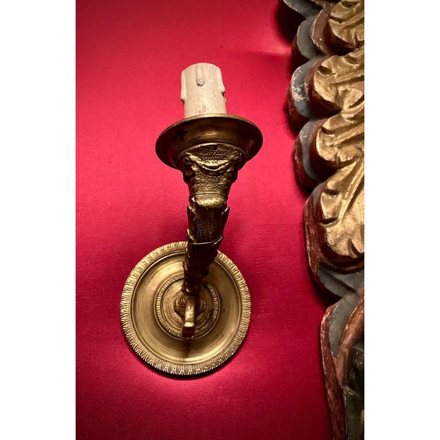 Refined set of eight italian louis xvi gilt bronze single-arm wall sconces, inspired by the neoclassical elegance of the...