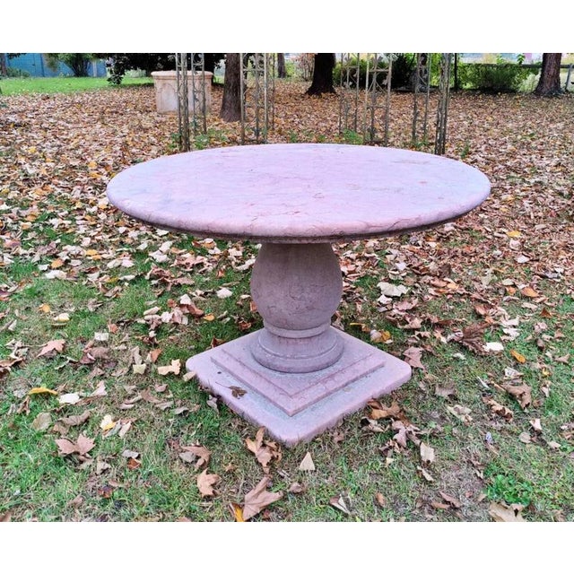 Charming round table in red Verona marble with a square base, early 19th century from Venice, private collection, 19th...