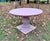 Charming round table in red Verona marble with a square base, early 19th century from Venice, private collection, 19th...