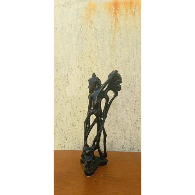 Abstract sculpture in Ebony wood by the student at Accademia di Belle Arte Venezia.