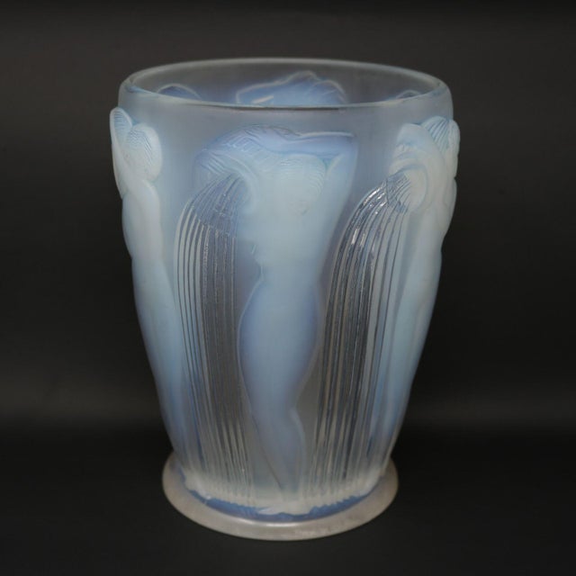 Rene Lalique Opalescent Glass 'Danaides' Vase. This pattern features the Daughters of Danaus stood pouring water from a...