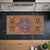 This authentic vintage Turkish Oushak rug showcases a delightful harmony of weathered pink tones and tribal geometric...