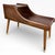 A beautifully sculptural mid-century teak telephone table attributed to Chippy Heath , showcasing elegant curves and...
