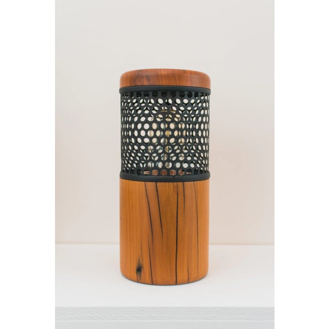 Farol table lamp by caio superchi dimensions: d 25 x w 11 x h 11 cm materials: solid wood + perforated metal plate +...