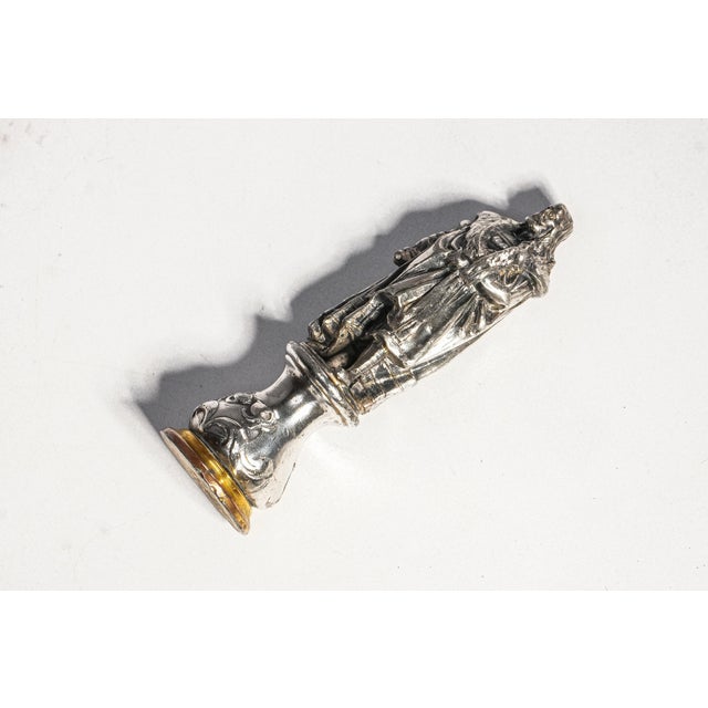 A fascinating and highly unusual antique desk wax seal surmounted by a miniature figure of the celebrated German...