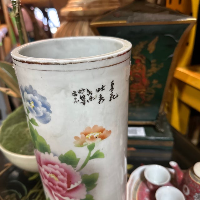 Up for consideration is a beautiful vintage Asian style white ceramic skinny vase with floral accents. This would look...