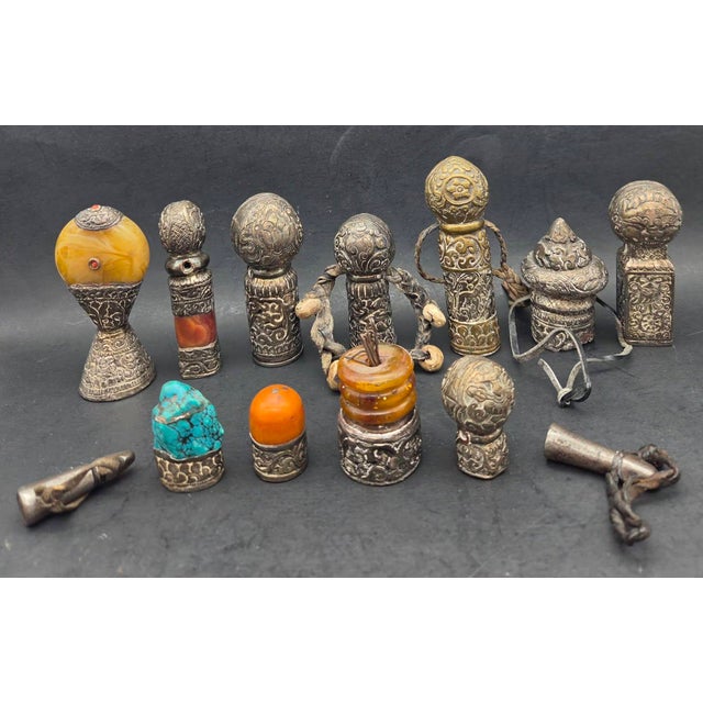 Offered is a lot of 13 Tibetan stamps and seals acquired on a trip to the Himalayan mountain range in the 1980s. Some are...