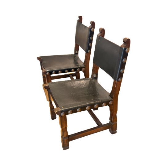 Striking pair of vintage Spanish Brutalist slug-leather chairs. These heavy, masculine accent chairs perfectly capture the...