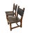 Striking pair of vintage Spanish Brutalist slug-leather chairs. These heavy, masculine accent chairs perfectly capture the...