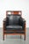 We are offering this black leather and wood Art Deco armchair by Schuitema from the Decoforma series. A piece of furniture...