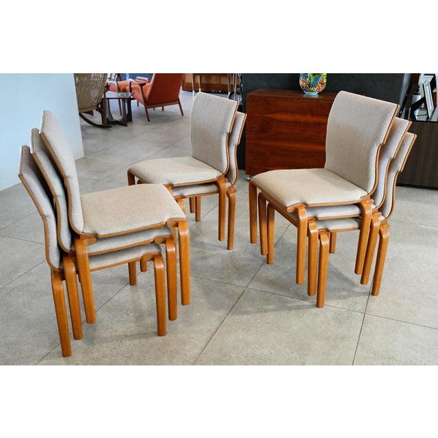 Postmodern / late mid-century bentwood dining chairs by Sanders International, featuring an elegant sculptural...