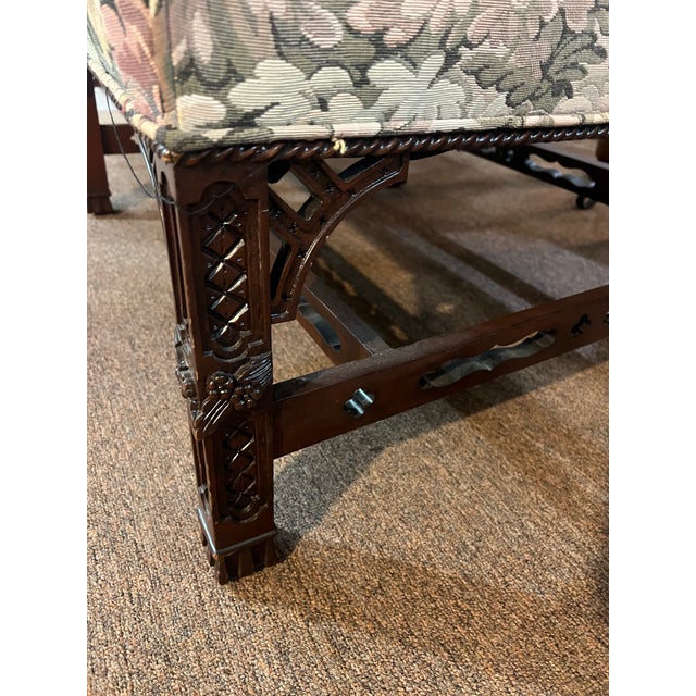 A beautiful Henredon Natchez Historic Collection camel back sofa in a lovely upholstered print. WIth a feather stuffed...