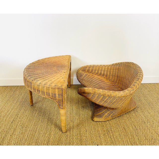 Magnificent vintage set in woven rattan, consisting of a sculptural armchair with organic curves and a matching half-moon-...