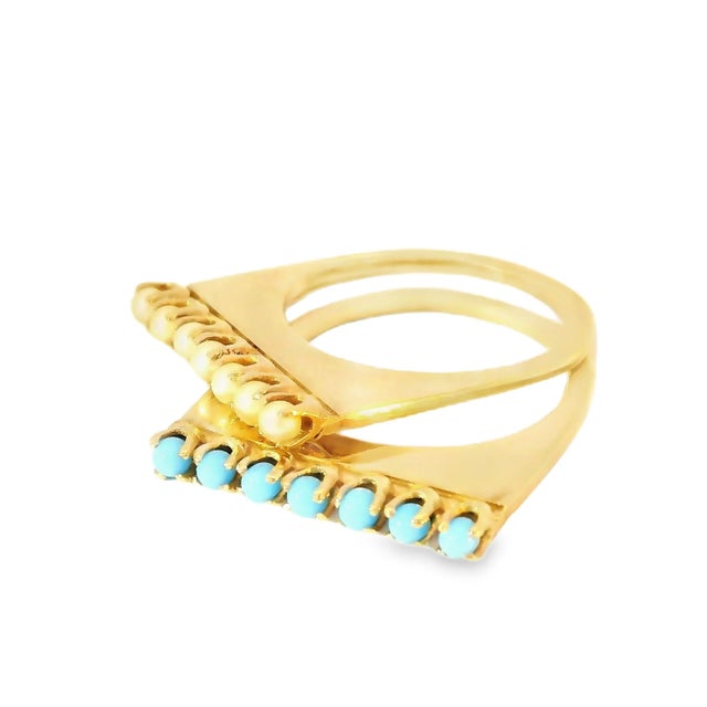 This exquisite estate jewelry set features two elegant 14K yellow gold bands, each adorned with natural gemstones. One...