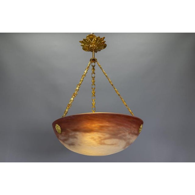 French art nouveau pendant light by muller frères lunéville, circa 1920s. elegant pendant featuring a pâte de verre glass...