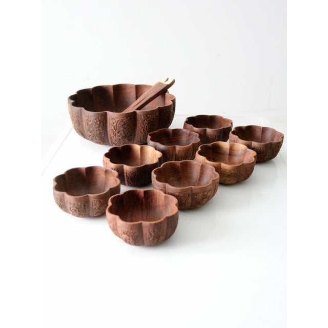 Elevate your dining experience with this stunning mid-century serving set. The set includes a large scalloped bowl, eight...