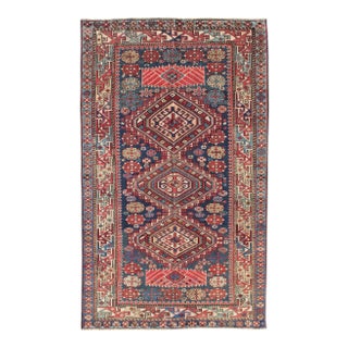 Antique Kazak Tri- Medallion Rug With Multi Coors and Indigo Background For Sale