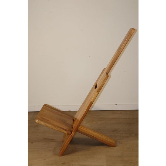 Charming lounge chair in the style of Alain Gaubert's designs. Crafted from solid elm in the 1980s, it captivates with its...