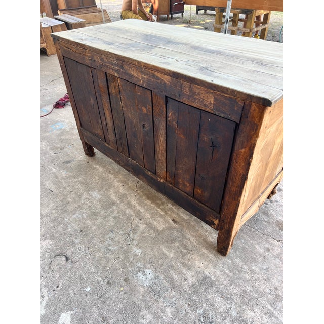 French 18th-century Louis XV bleached walnut two-door buffet, featuring beautifully carved paneled doors, elegant cabriole...