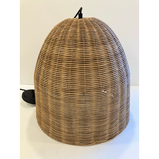 This vintage wicker hanging light has a nice patina that can only be achieved by age The condition is excellent The cord...