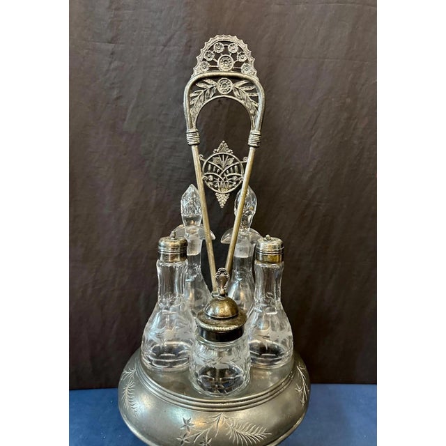 This vintage Victorian condiment caddy is designed by the Pairpoint Company & is a traditional late 19th century dining...