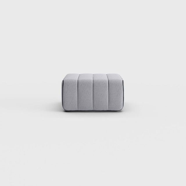Pouf, stool, ottoman—or simply the building block for what is probably the world’s most versatile sofa system? The Curt...