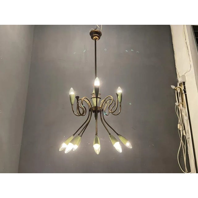 Italian stilnovo bronze light green light pendant 1950’s bronze frame with light green metal shades. height 90 cm width 41...