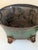 This item is a hand-painted coal scuttle originally used to carry and store coal for fireplaces. It adds a touch of class...