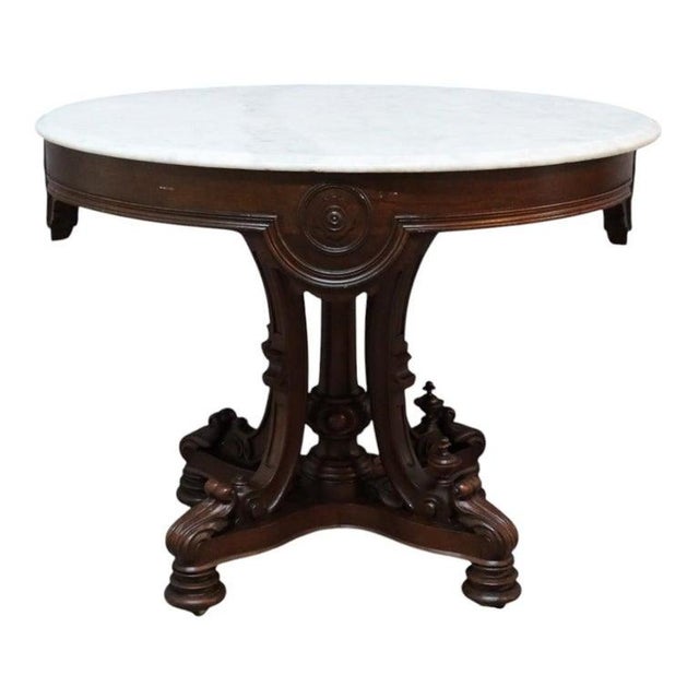 This antique Berkey & Gay (attributed) table, dating to approximately 1880, exemplifies the Renaissance Revival style....