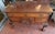 A finely carved walnut Philadelphia lowboy with carved clawfeet and carved shell and brass fittings is in great condition...