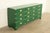 An exceptional mid-century modern Hollywood Regency Campaign twelve-drawer dresser, credenza, or chest of drawers By...