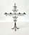 1960s hand wrought steel cross shaped candelabra by Gunnar Ander. Stamped steel hearts are suspended from horizontal arms....