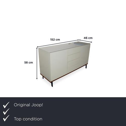 Sideboard from joop! that combines clean lines with sophisticated material contrasts. The cream-white high-gloss fronts...