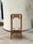 This vintage bamboo planter stand is a stylish blend of Chinese Chippendale, chinoiserie, and Hollywood Regency design in...