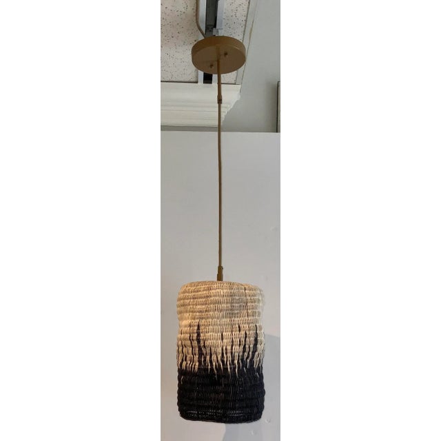 Original Retail $1040, stylish Currey & Co. Organic Modern Wicker Des Panlers Pendant, black and tan with antique brass...