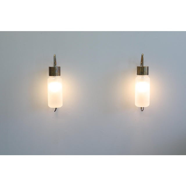 Pair of Luigi Caccia Dominioni Azucena Model LP10 Brass Wall Lamps 1958 This piece has an attribution mark, I am sure that...