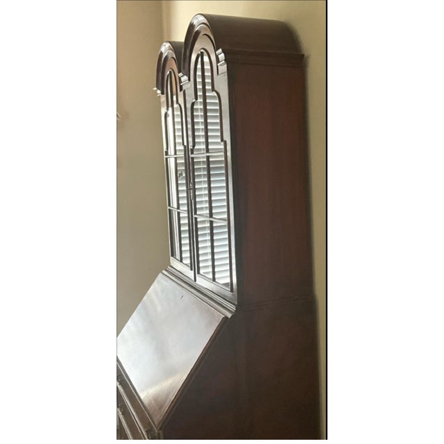 This English made beauty is a Walnut Bureau Bookcase by Holland and Company INC. The lower part is a secretary desk with...