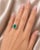 Metal: 18K White Gold Primary Stone: Natural Oval Emerald 1.1 CT Accent Stones: 12 Round Brilliant Diamonds 0.4 CT Ring...