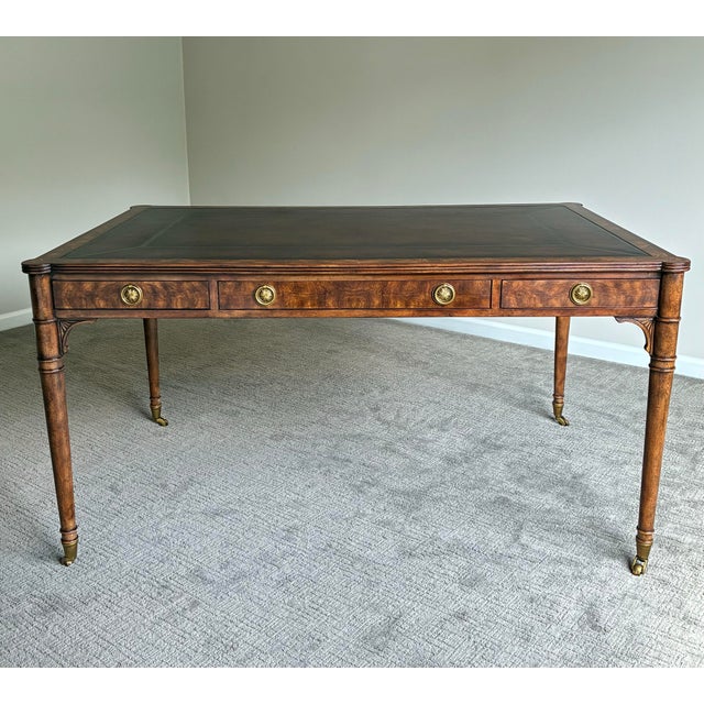 Exceptional Theodore Alexander ‘Man of Letters’ partners writing desk crafted in richly figured flame mahogany veneers...