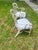 Elegant pair of vintage cast aluminum armchairs in the style of Veneman, featuring beautifully sculpted openwork backs,...